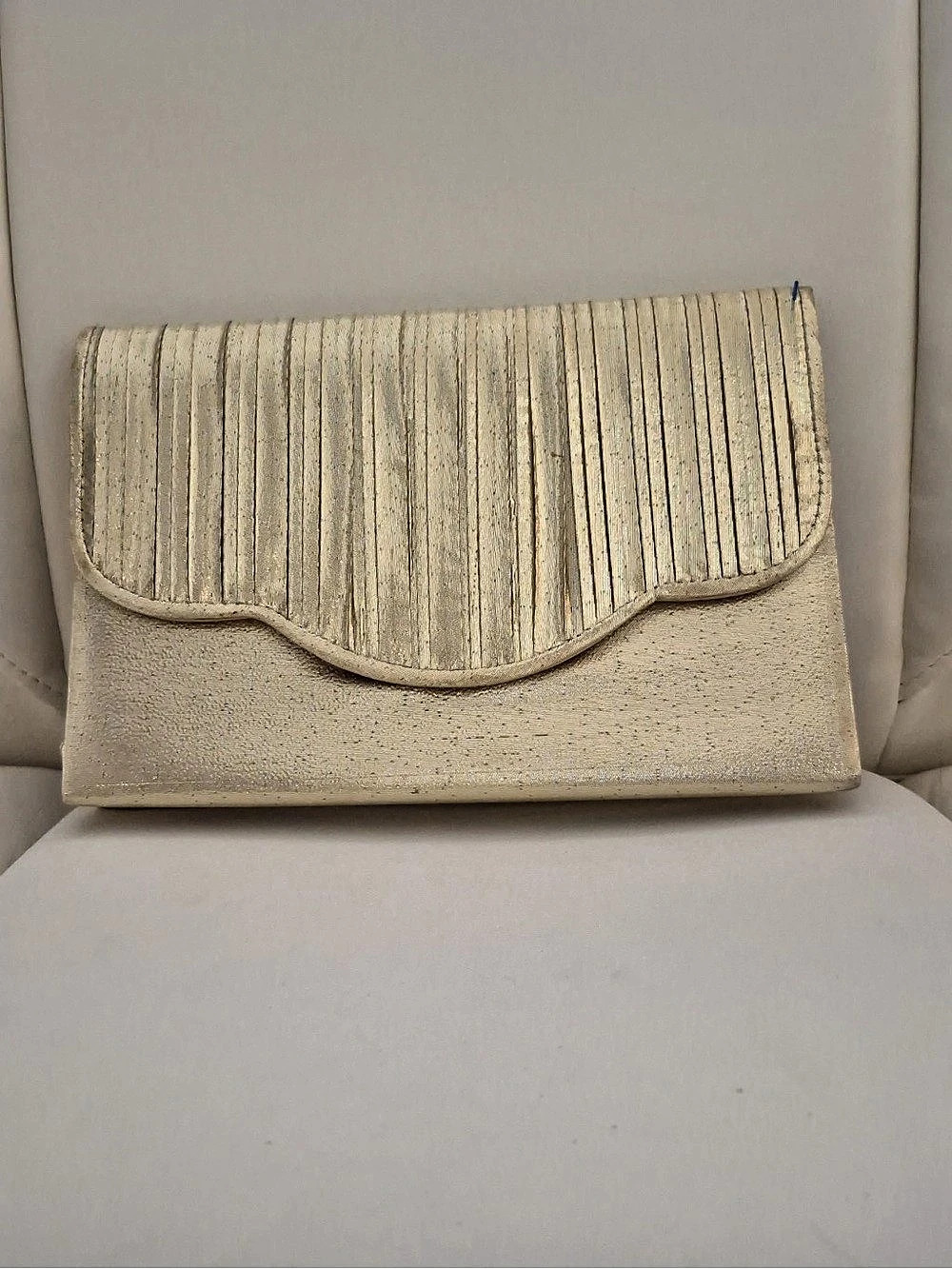 La Regale Textured Gold Clutch